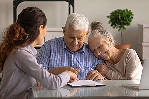 a couple reaching a sell agreement on their life insurance policy